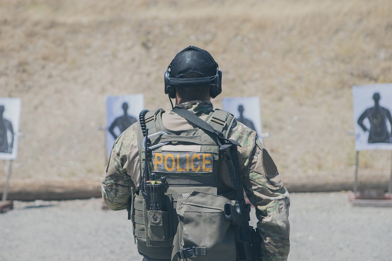 police on practice range using gun safety fundamentals