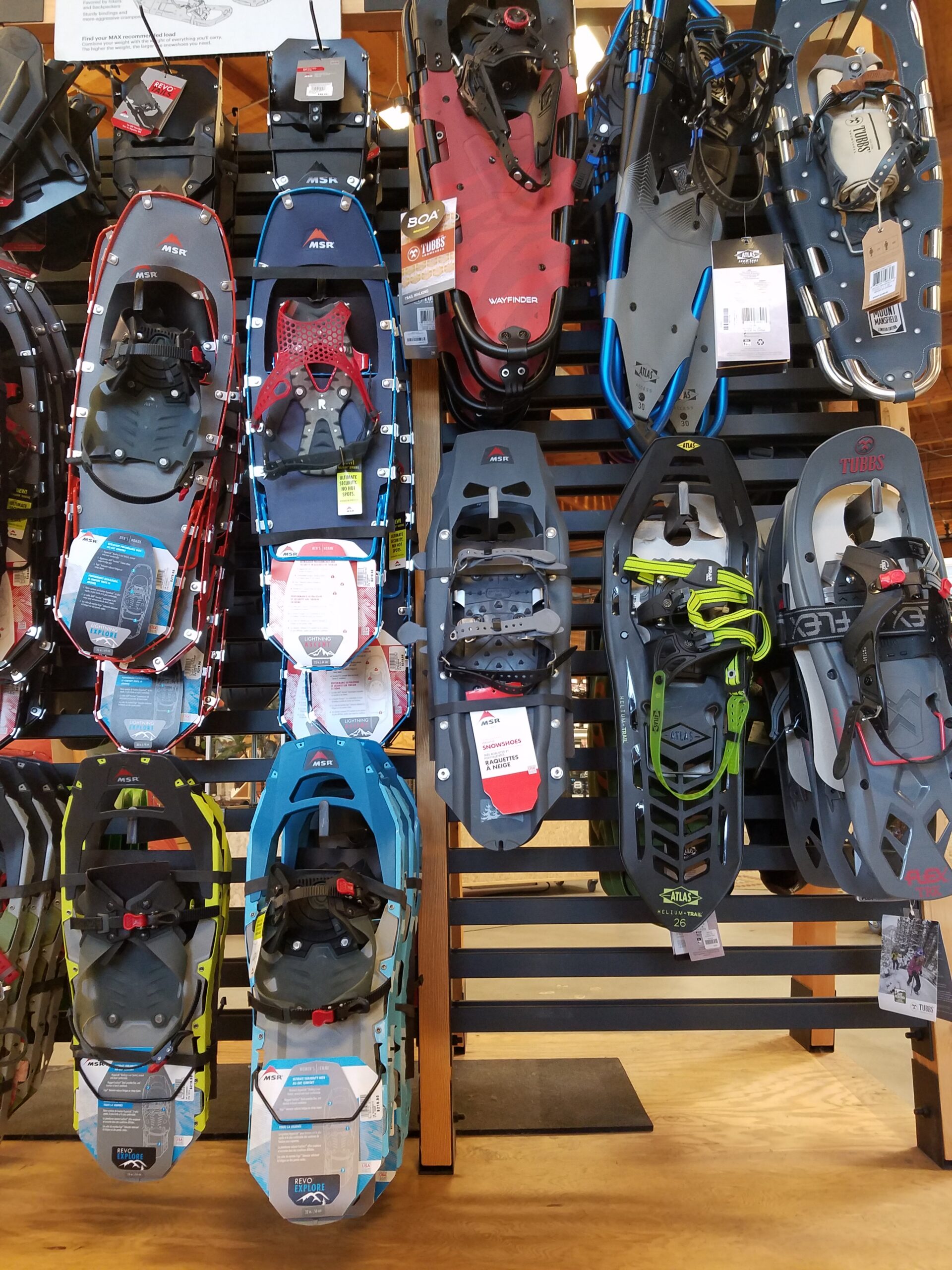 snowshoe choices on a display rack