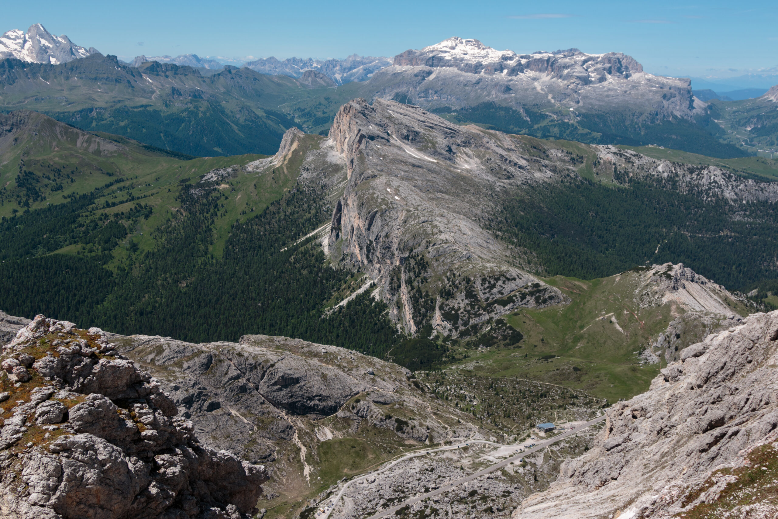 Mountain Ridge with Big Stone among Barren Mountains in Italian